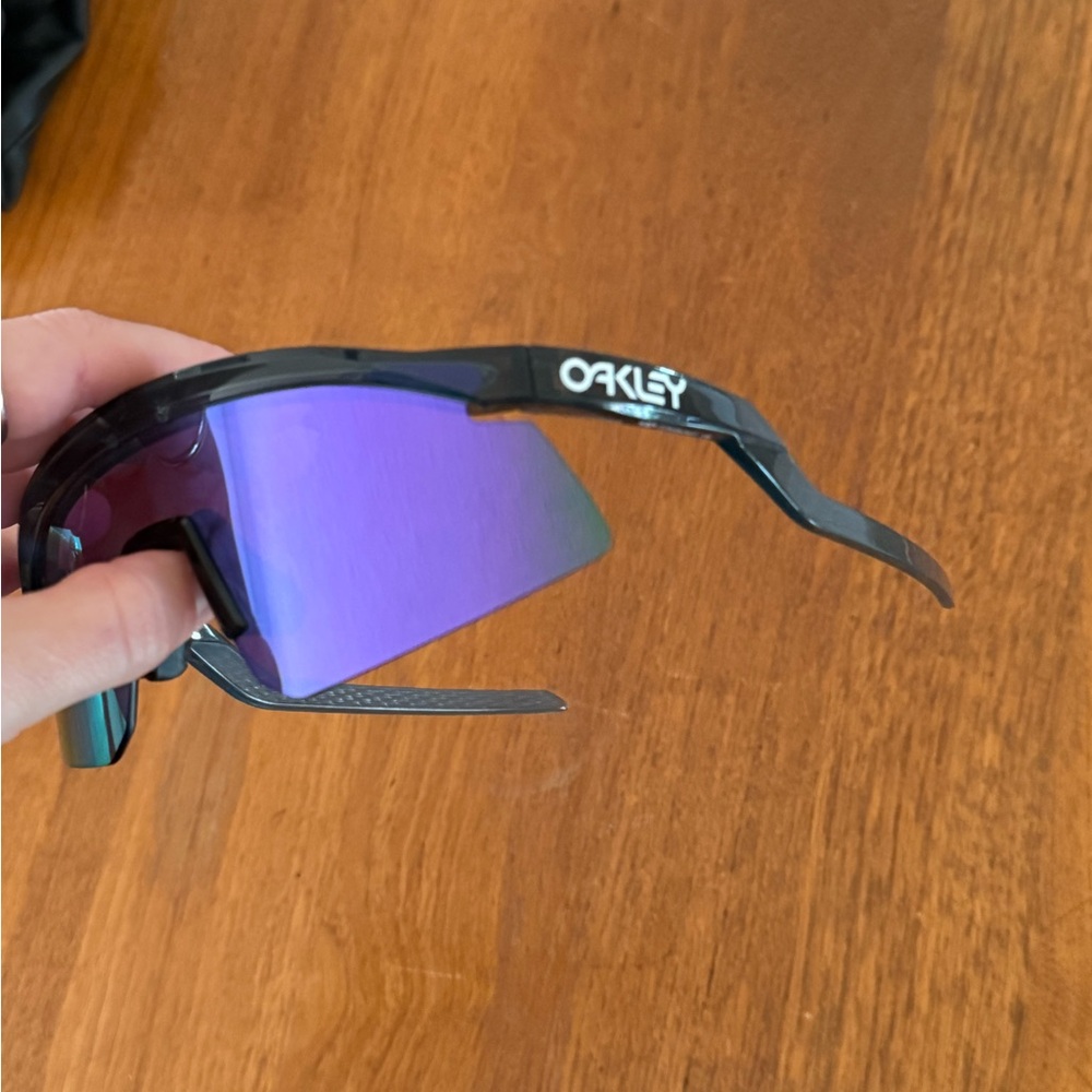 Oakley Black Frame Sunglasses with Purple Mirrored Lens